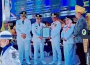 Bupati Bangkep Terima Penghargaan UHC Kategori Madya di Peringatan HUT ke-61 Sulteng